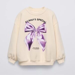 Zara Cream Sweatshirt with Purple Bow